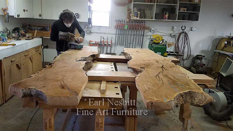 Earl leveling slabs for a custom made mesquite live edge dining table Earl leveling slabs for a custom made mesquite live edge dining table